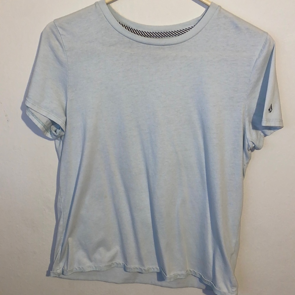 Girl’s size XL, light blue Volcom t-shirt.